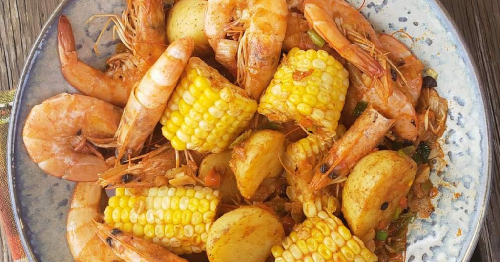 Recipes 8 a bowl of corn chunks, baby potatoes, and shrimp
